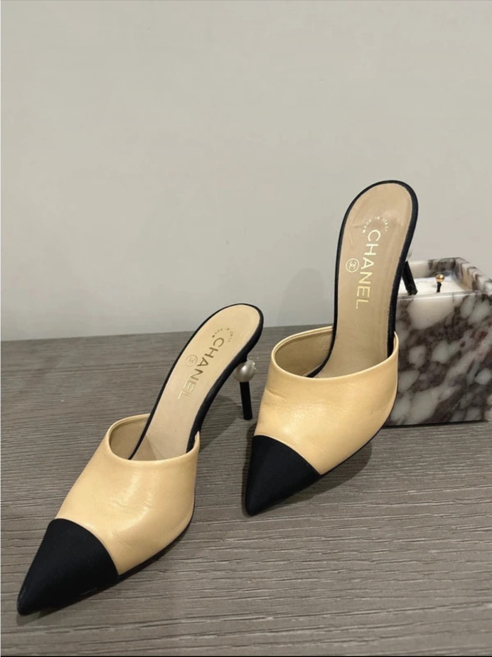CHANEL Two-Tone Beige and Black Pointed-Toe Mules with Pearl Heel Detail 37.5